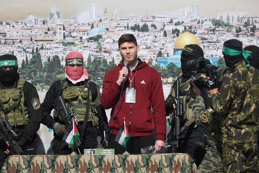 Russian-Israeli Sasha (Alexander) Troufanov, a hostage held in Gaza since the deadly October 7, 2023 attack, speaks as he is released by Palestinian Hamas and Islamic Jihad militants as part of a ceasefire and a hostages-prisoners swap deal between Hamas and Israel in Khan Younis, in the southern Gaza Strip, February 15, 2025.