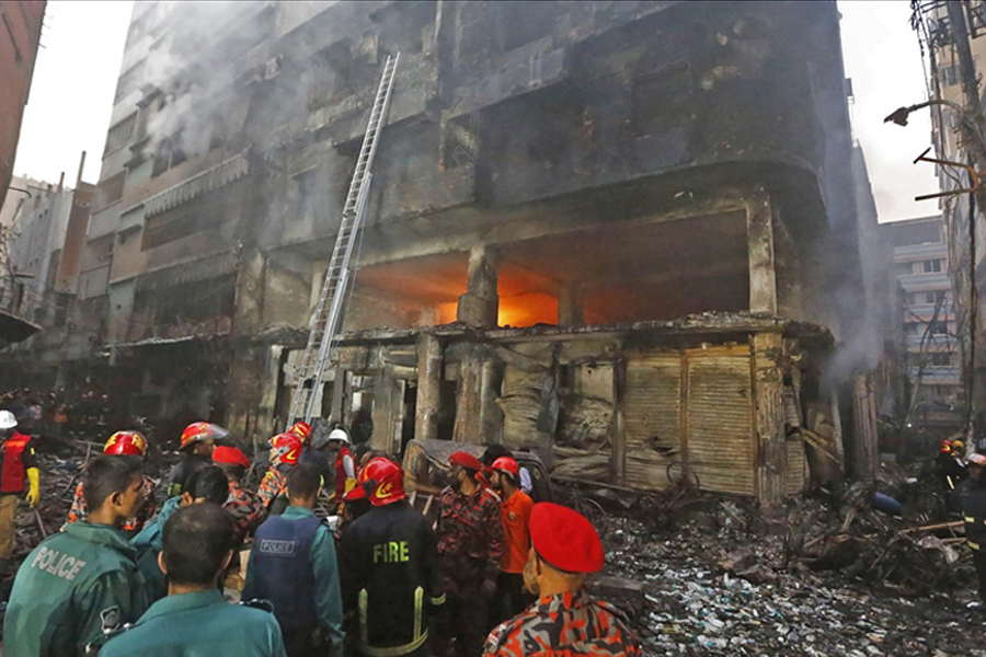 Firefighters are seen at the scene of a fire in Dhaka on February 21, 2019. At least 70 people were killed on February 20, 2019 when a massive fire spread through several apartment buildings in Bangladesh's capital —Agency photo