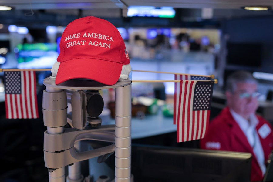A "Make America Great Again" hat, in support of US Republican presidential nominee and former US President Donald Trump, is seen on display on the trading floor at The New York Stock Exchange (NYSE), in New York City, US, September 18, 2024.