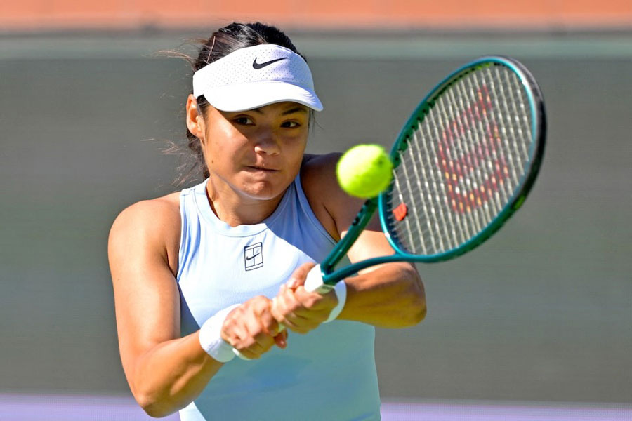 Mar 6, 2025; Indian Wells, CA, USA; Emma Raducanu (GBR) hits a shot during her first round match against Moyuka Uchijima (not pictured) in the BNP Paribas Open at the Indian Well Tennis Garden.