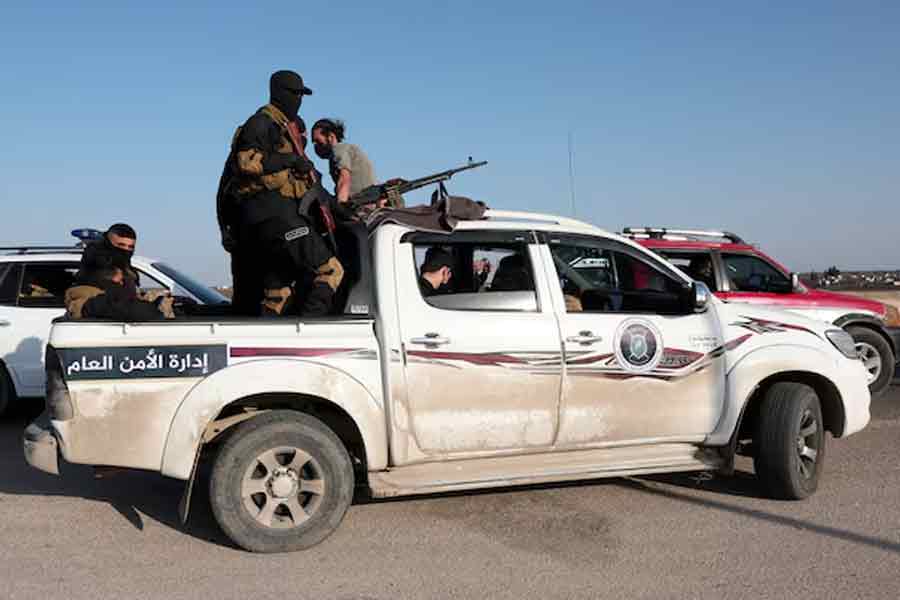 Syrian army personnel heading towards Latakia in a military vehicle from in Aleppo on Friday to join the fight against the fighters linked to Syria's ousted leader Bashar al-Assad –Reuters photo