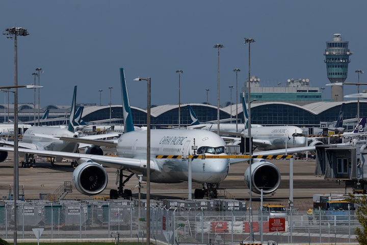 Cathay Pacific aircraft are seen parked at Hong Kong International Airport in Hong Kong, China August 7, 2024. REUTERS/Tyrone Siu/File Photo