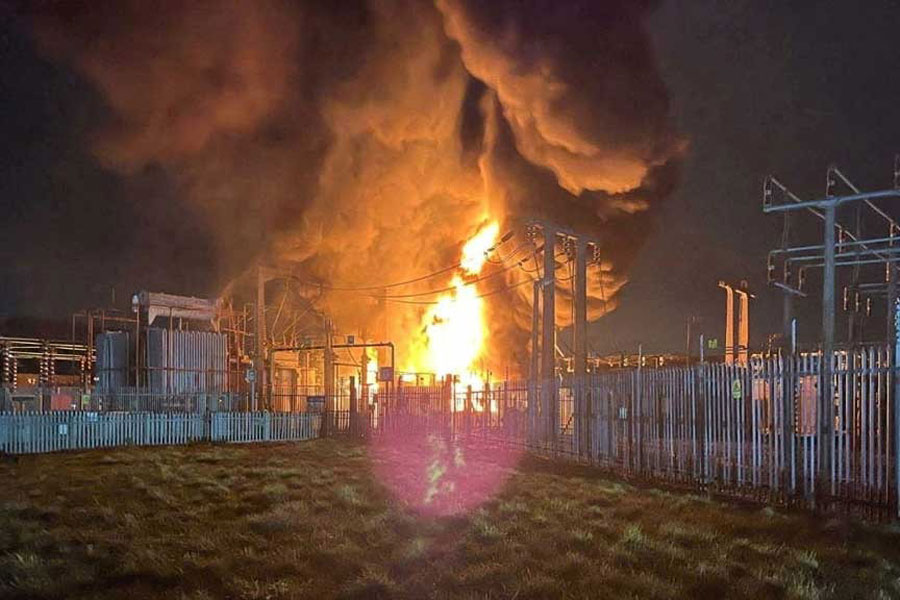 Fire, which wiped out power and closed Heathrow Airport, rises at the North Hyde Electricity Substation in Hayes, Britain in this handout picture released on Mar 21, 2025.