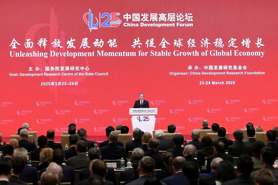 Chinese Premier Li Qiang delivers a speech during the opening ceremony for the China Development Forum at Diaoyutai Guesthouse in Beijing, China March 23, 2025.