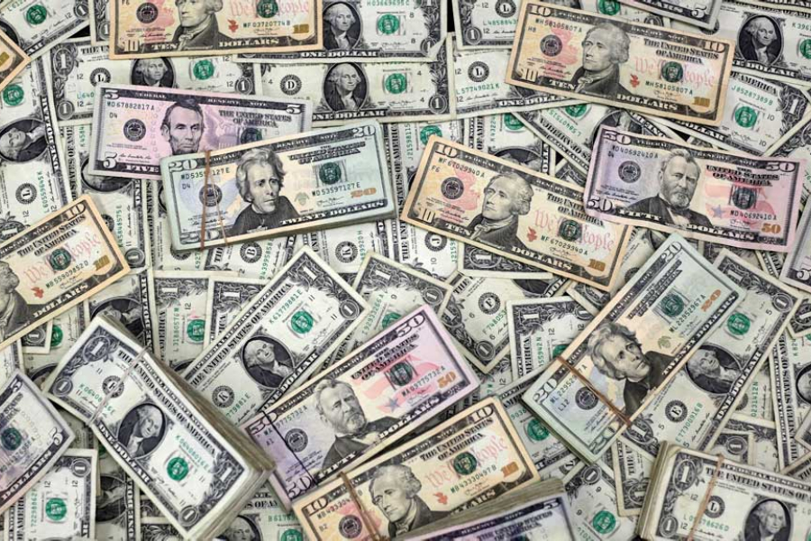 US dollar banknotes are seen in this photo illustration taken Feb 12, 2018.