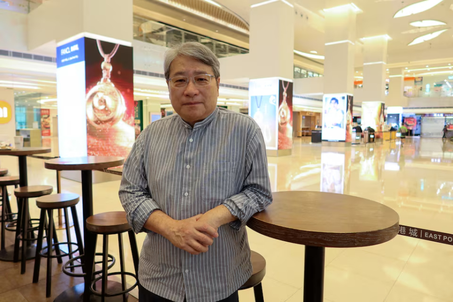 Fred Li, former lawmaker and Democratic Party member, poses for pictures after an interview with Reuters, in Hong Kong, China on March 26, 2025
