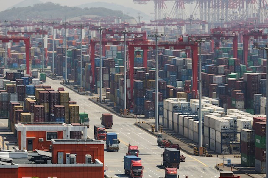 Gantry cranes stand near shipping containers at Yangshan Port outside of Shanghai, China on April 15, 2025 — Reuters photo