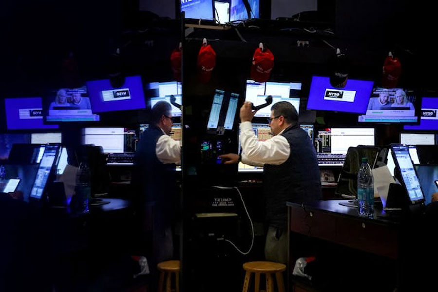 A trader works on the floor at the New York Stock Exchange (NYSE) in New York City, US, April 15, 2025.