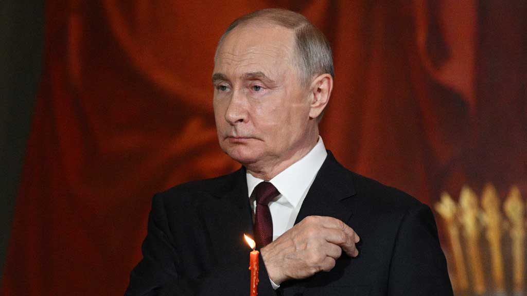 Russian President Vladimir Putin attends the Orthodox Easter service at the Cathedral of Christ the Saviour in Moscow, Russia Apr 20, 2025. Sputnik/Ramil Sitdikov/Pool via REUTERS