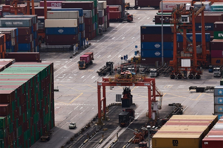 A truck carrying containers moves at the Yantian port in Shenzhen, Guangdong province, China on April 17, 2025 — Reuters photo