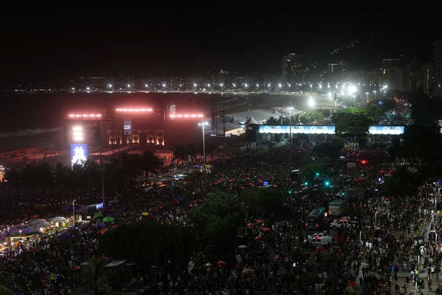People gather before Lady Gaga's open concert, in Copacabana beach in Rio de Janeiro, Brazil May 3, 2025.
