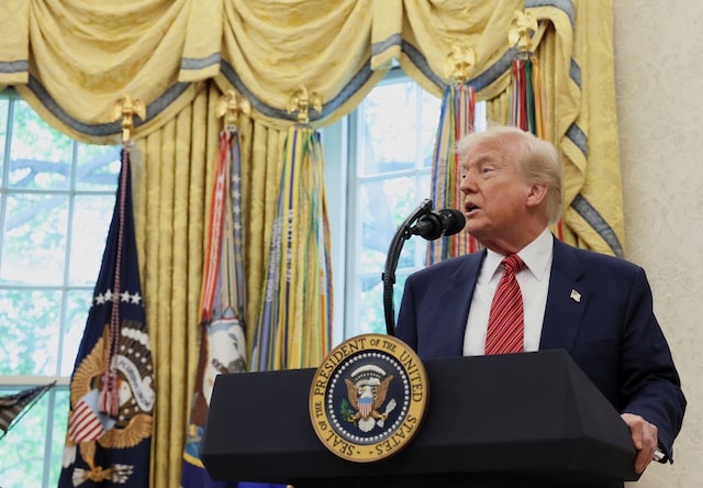 US President Donald Trump takes questions from the media following former US Senator David Perdue's swearing-in ceremony to be the new U.S. ambassador to China, at the White House in Washington, D.C., U.S., May 7, 2025. REUTERS/Leah Millis/File Photo