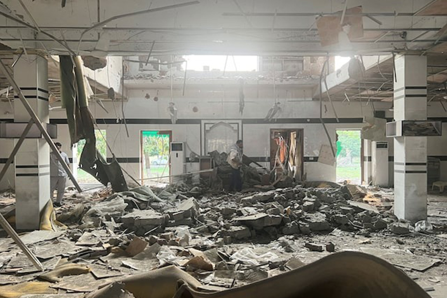 A man walks inside a mosque after it was hit by an Indian strike, in Muridke near Lahore, Pakistan on May 7, 2025 — Reuters photo