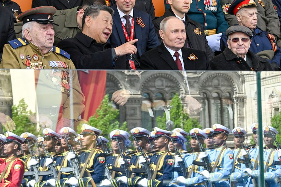 Russian President Vladimir Putin and his Chinese counterpart Xi Jinping attend a military parade on Victory Day, marking the 80th anniversary of the victory over Nazi Germany in World War Two, in Red Square in central Moscow, Russia, May 9, 2025.