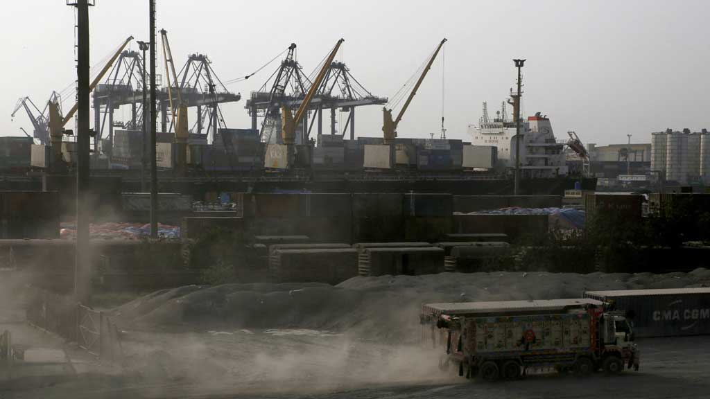A truck moves past cranes during a media tour of the Karachi Port, Pakistan, May 9, 2025. REUTERS