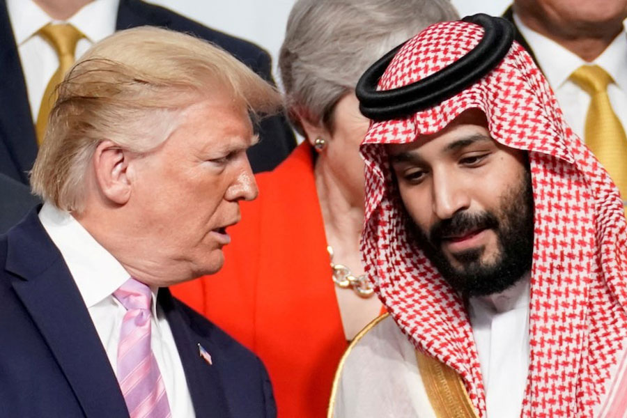 US President Donald Trump speaks with Saudi Arabia's Crown Prince Mohammed bin Salman at a G20 summit in Japan, June 28, 2019.
