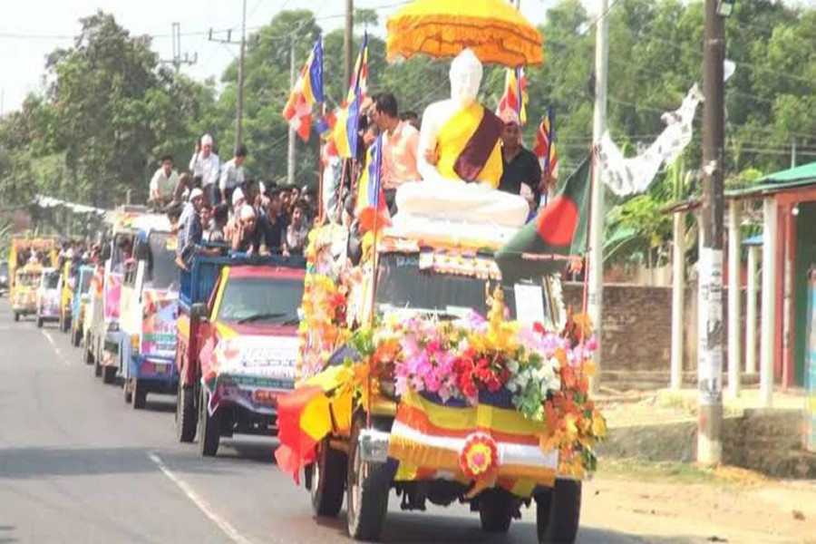 People celebrate Buddha Purnima, largest religious festival of the Buddhists community, with different programmes in Cox's Bazar city- FE Photo