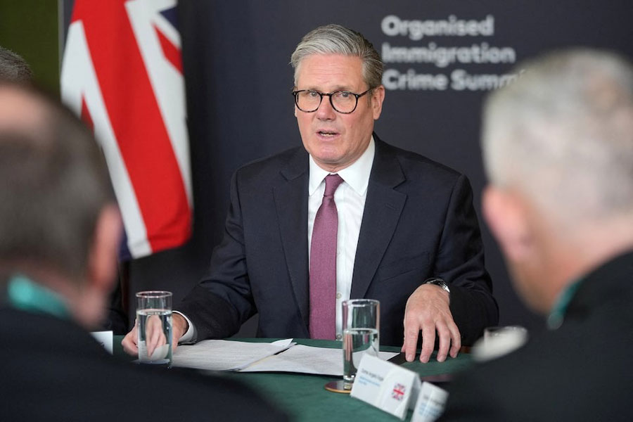 Britain's Prime Minister Keir Starmer leads a roundtable discussion at the Border Security Summit in London, Britain March 31, 2025.