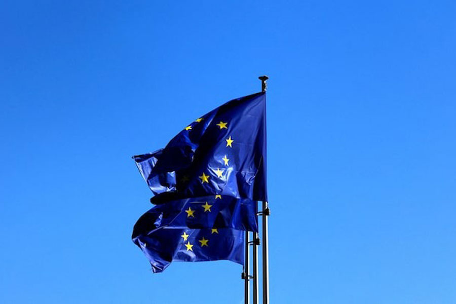 European Union flags flutter outside the EU Commission headquarters in Brussels, Belgium March 18, 2025.