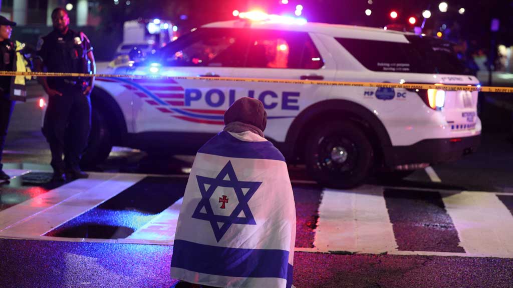 Emergency personnel work at the site where, according to the US Homeland Security Secretary, two Israeli embassy staff were shot dead near the Capital Jewish Museum in Washington, DC, US May 21, 2025. REUTERS/Jonathan Ernst