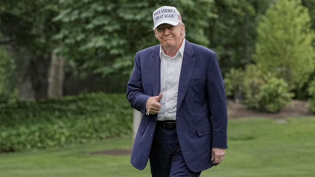 US President Donald Trump gives a thumbs up as he walks on the South Lawn of the White House in Washington, DC, US, May 25, 2025. REUTERS