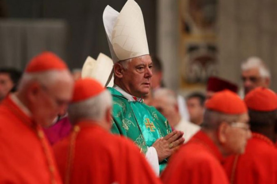 Newly elected cardinal Gerhard Ludwig Muller of Germany arrives during a consistory ceremony led by Pope Francis in Saint Peter's Basilica at the Vatican on February 22, 2014. - File photo