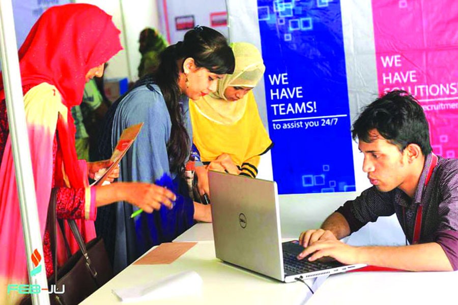 Students queue up for registration for Prodex 2017, a national business competition, at the Jahangirnagar University campus.
