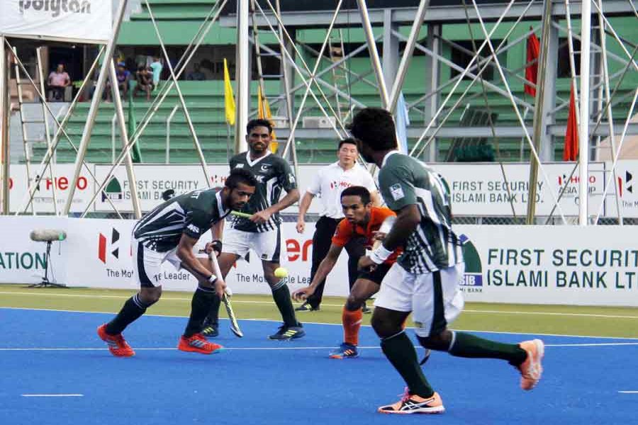 Malaysian and Pakistani hockey players in action during their match in Hero 10th Men's Asia Cup at Maulana Bhashani Stadium in the city on Wednesday. — Focus Bangla