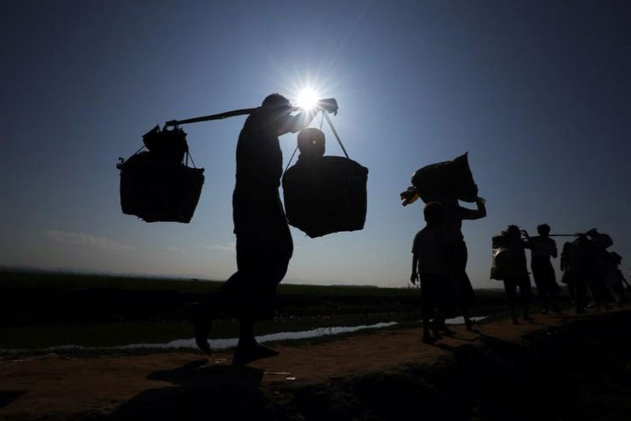 Rohingya refugees make their way to a refugee camp after crossing the Bangladesh-Myanmar border in Palong Khali, near Cox's Bazar, Bangladesh, November 3, 2017. - Reuters photo