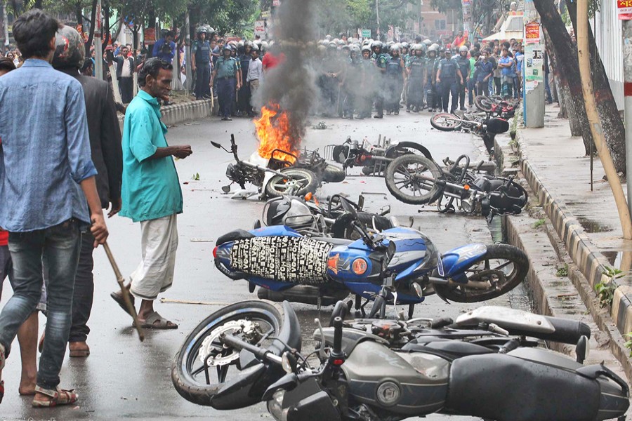 A number of motorcycles were torched during a clash between two groups of ruling party Awami League in front of a community centre at Azimpur in the capital on Thursday. The skirmish took place around 10:30am. — Focus Bangla