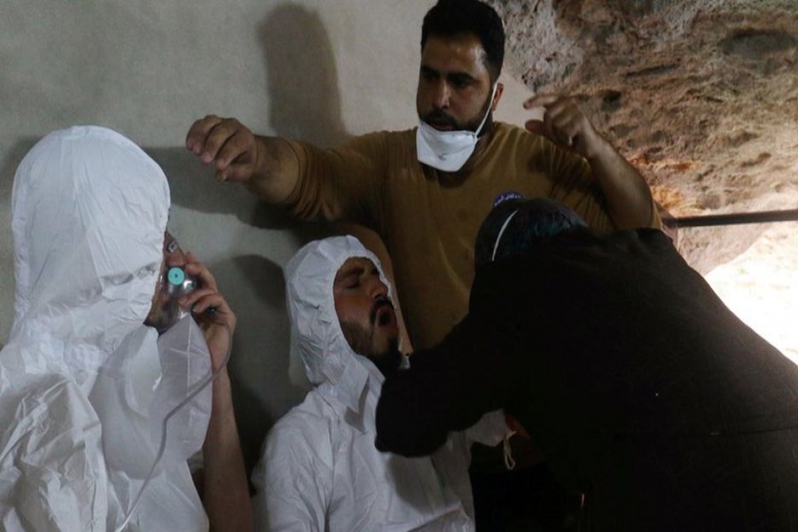 Some victims taking treatment at a hospital. A nerve gas attack on the town of Khan Sheikhoun in April killed more than 80 people. — Reuters file photo