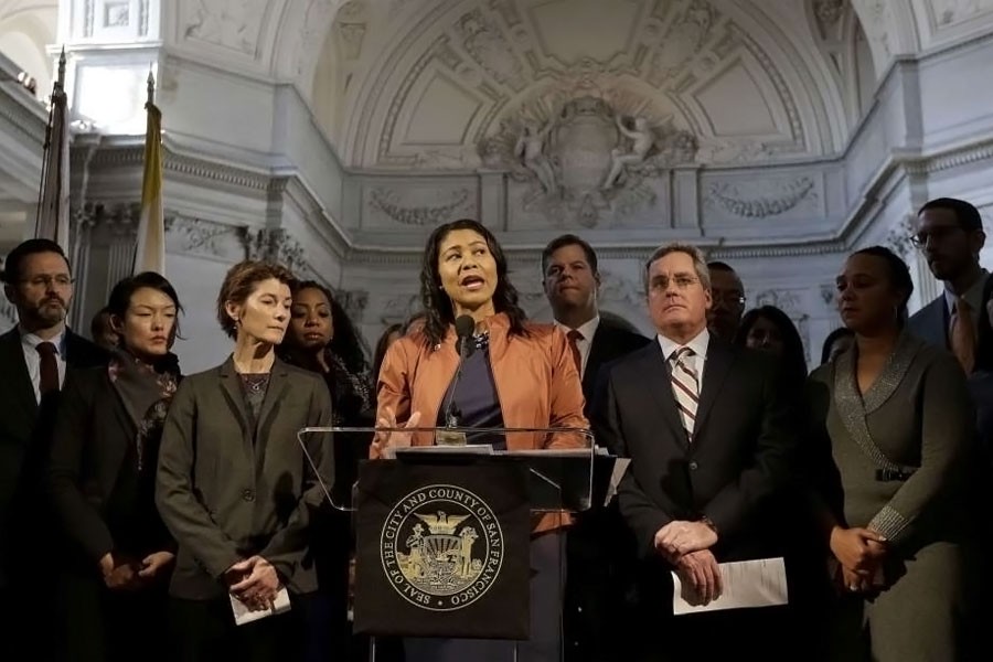 San Francisco Board of Supervisors President and acting mayor London Breed, center, speaks at a news conference at City Hall in San Francisco, Tuesday, Dec. 12, 2017. (AP photo)