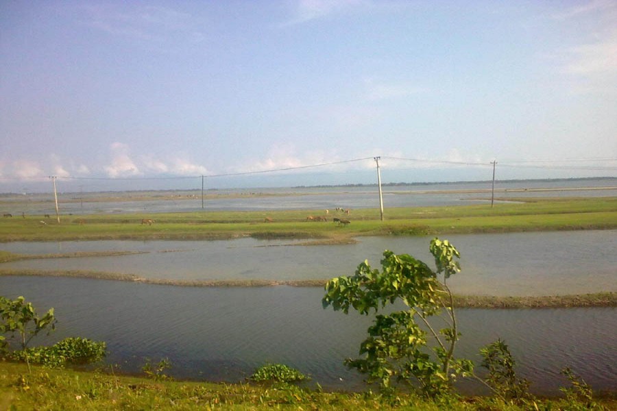 The photo shows a vast area of Sunamganj still under water. — FE Photo
