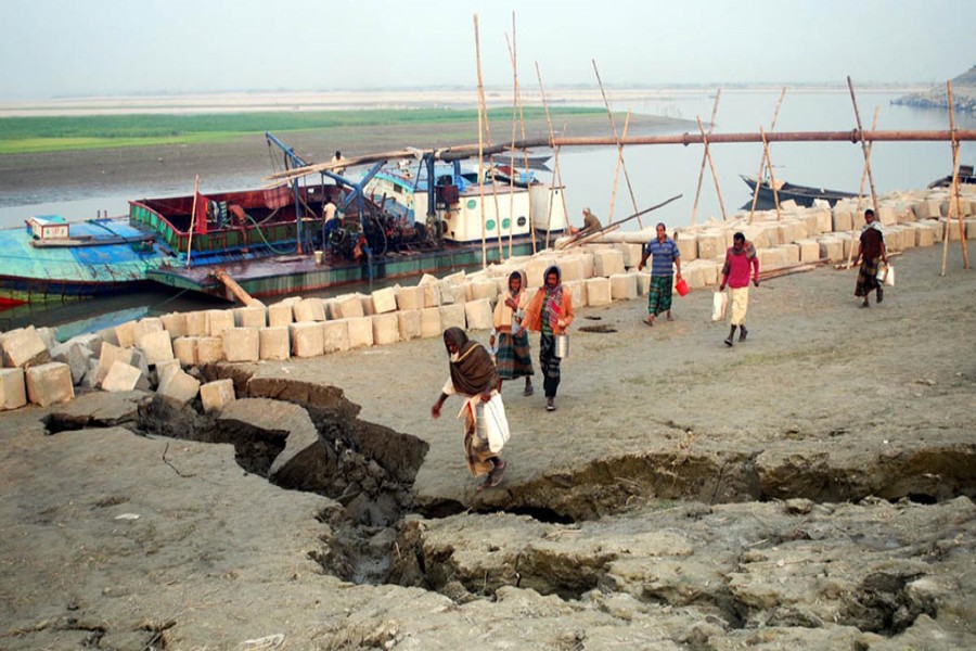 Unabated sand lifting from the Jamuna affected a vast area of Dhunot upazila in Bogra. — FE Photo