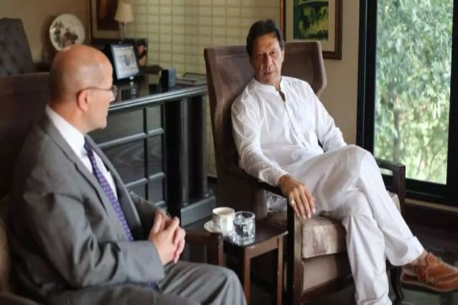 Pakistani prime minister-in-waiting Imran Khan holding talks with acting US Ambassador in Pakistan John F Hoover in Islamabad on Wednesday — AFP