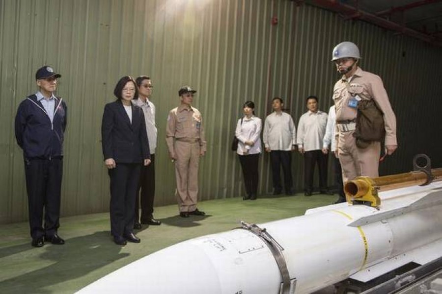 In this file photo, Taiwan's President Tsai Ing-wen, second from left, listens to a brief on a missile at Su'ao naval station during a navy exercise in the northeastern port of Su'ao in Yilan County, Taiwan. –AP