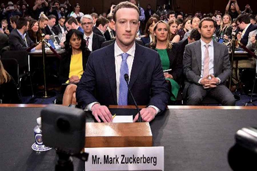 Facebook CEO Mark Zuckerberg arrives to testify before a joint hearing of the US Senate Commerce, Science and Transportation Committee and Senate Judiciary Committee on Capitol Hill, April 10, 2018 in Washington, DC. —Photo: AFP