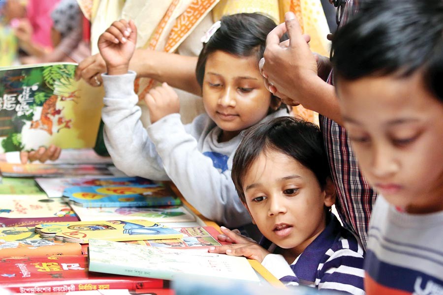 Children throng the Ekushey Grantha Mela (book fair) in Dhaka city — FE file photo
