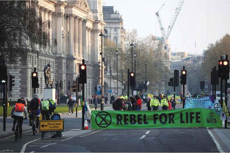 Climate change activists block Parliament Square during the Extinction Rebellion protest in London on April 17, 2019. —Photo: Reuters