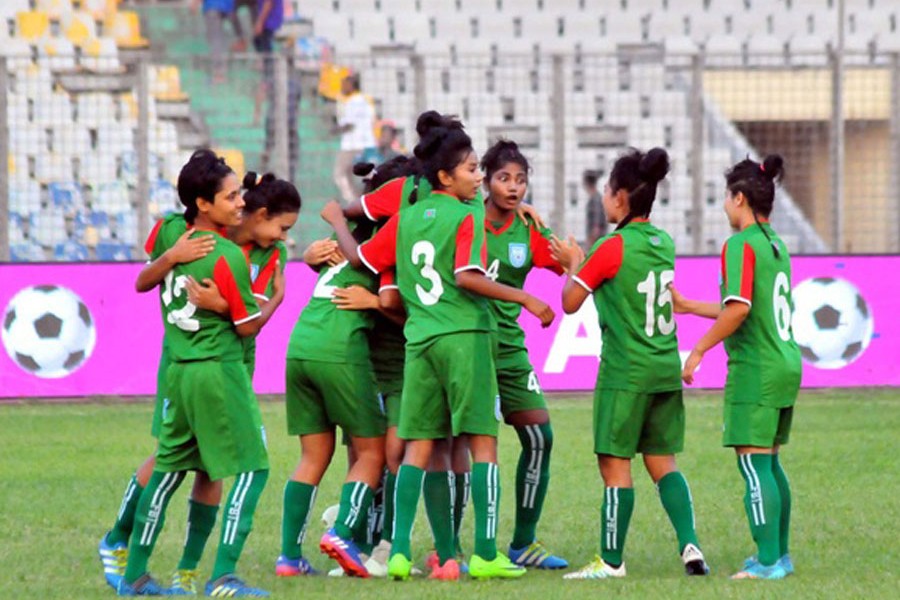 Bangladesh women's football team celebrating after beating Kyrgyzstan in the Bangamata U-19 Women's International Gold Cup Football at Bangabandhu National Stadium in the city on Friday — bdnews24.com