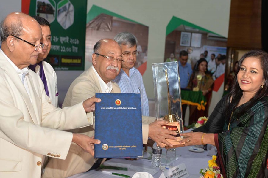 Industries minister Nurul Majid Mahmud Humayun (third from left) handed over “National Productivity and Quality Excellent Award-2018” at the Institution of Diploma Engineers, Bangladesh (IDEB) auditorium in the city today (Sunday). State minister for industries Kamal Ahmed Mojumder (first from left), among others, was also present -- PID photo