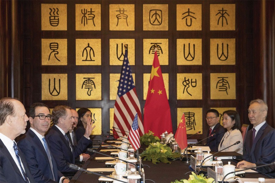 CHINA-US TRADE TALKS RESUME IN SHANGHAI IN SHADOW OF DONALD TRUMP'S ANGRY TWEETS AIMED AT BEIJING: Chinese Vice-Premier Liu He (right) with US Trade Representative Robert Lighthizer (third left) and US Treasury Secretary Steve Mnuchin (second left) in Shanghai on July 31, 2019. —Photo: AP