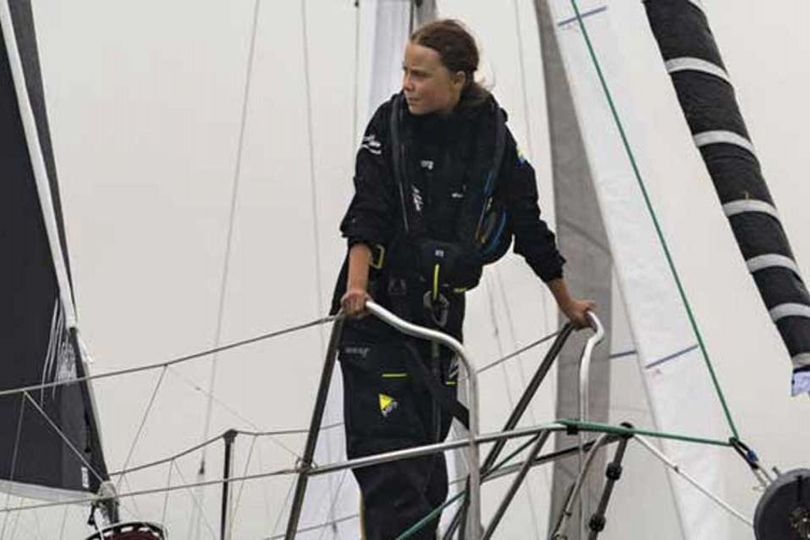 Greta Thunberg, 16-year-old climate activist from Sweden, sails into New York Harbor on August 28, 2019 flanked by a fleet of 17 sailboats representing each of the Sustainable Development Goals on their sails. She embarked on a trans-Atlantic voyage on August 14 from Plymouth, England to New York City on a solar-powered, zero-emission racing boat, the Malizia II, to attend the UN Climate Action Summit in New York September 23, one of six summit meetings scheduled to take place late September. —Photo credit: UN Photo/Mark Garten