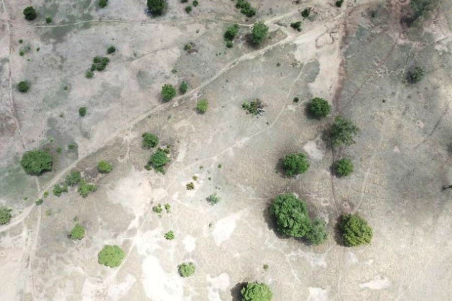 Forest fires, droughts and other forms of land degradation cost the global economy as much as US$15 trillion every year and are deepening the climate change crisis. Pictured is a drone visual of an area in Upper East Region, Ghana prior to restoration taken in 2015. —Credit: Albert Oppong-Ansah /IPS