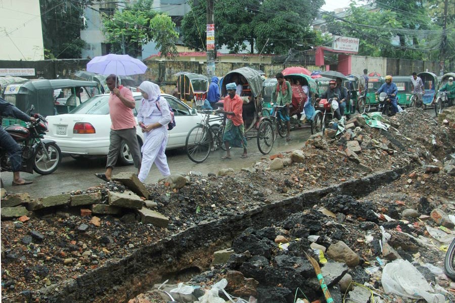 Pedestrians suffer much due to indiscriminate digging of roads for development work in the Sylhet City Corporation area — FE Photo