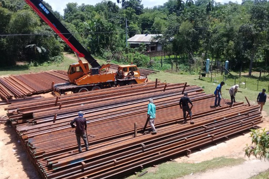Rail tracks are stockpiled for the reconstruction of the Kulaura-Shahbajpur section of Bangladesh Railway under Indian credit programme — FE Photo