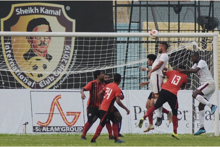 Players of Young Elephants Football Club and TC Sports Club fighting for ball at the third edition Sheikh Kamal International Club Cup Football Tournament at the MA Aziz Stadium in Chattogram on Friday — bdnews24.com