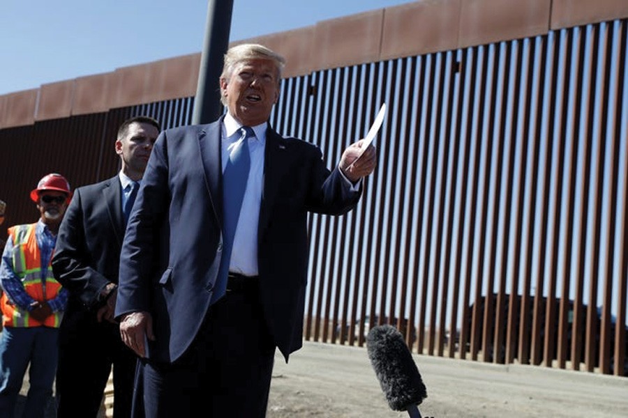President Donald Trump talks with reporters as he tours a section of the southern border on September 18, 2019, in Otay Messa, California, USA. —Photo: AP