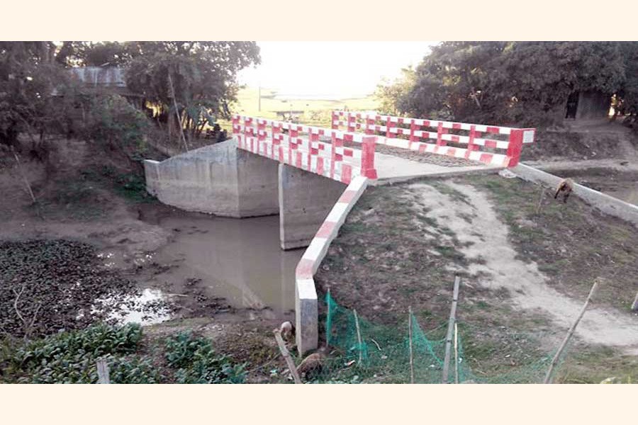 A newly-constructed bridge over a canal under Shulla upazila of Sunamganj district which does not have any connecting roads — FE photo