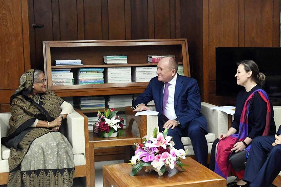 A delegation of Russian public joint stock company Gazprom paying a courtesy call on Prime Minister Sheikh Hasina at Sangsad Bhaban on Tuesday. -PID Photo